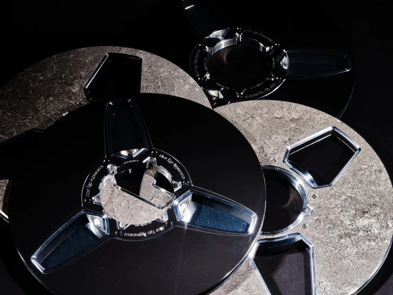 Close-up of sculpted metal reels